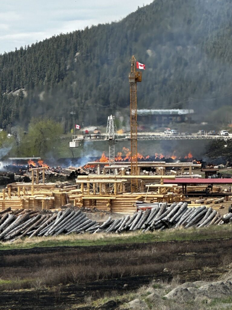 Several Fire Departments On Scene Of A fire At Pioneer Log Homes