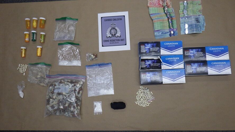 Williams Lake RCMP Seize Drugs, Cash, Firearms, Cigarettes, and Arrest Two People in Search Warrant