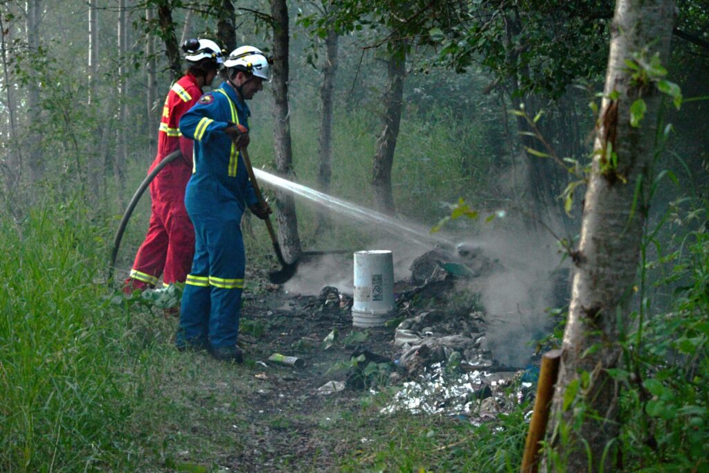 QVFD Extinguish Fire Behind G.R. Baker Hospital