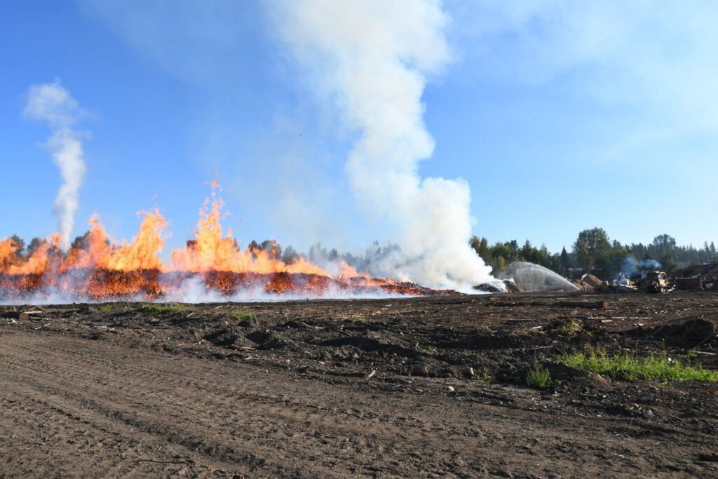 Quesnel log pile fire remains under investigation