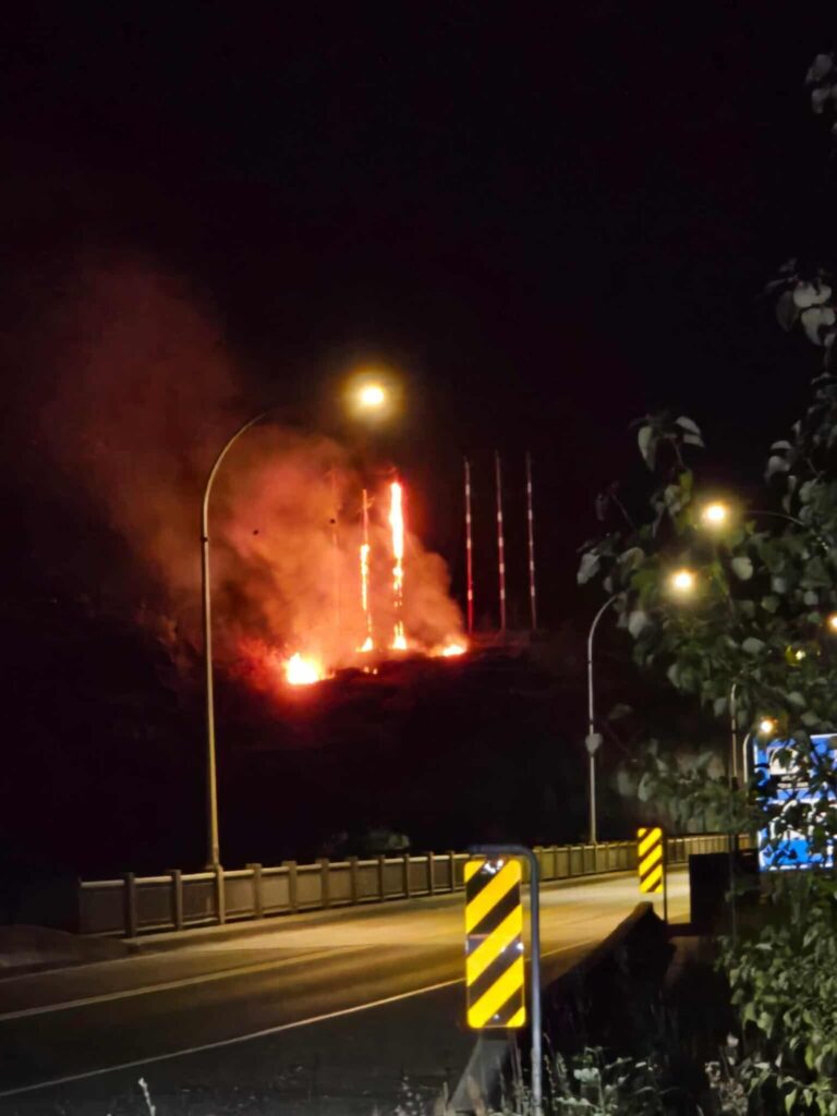 Power poles burn at Brilliant