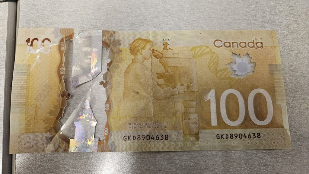 100 Mile RCMP still finding counterfeit $100s