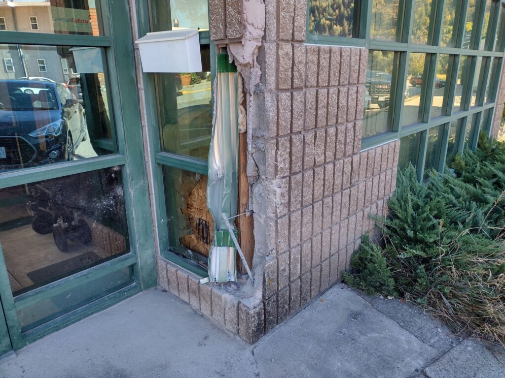 Trail man crashes vehicle into local business