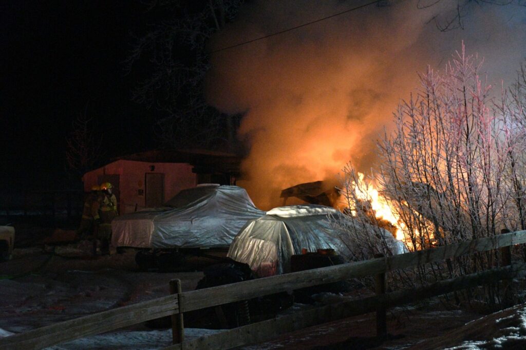 Two outbuildings damaged by fire in the 10 Mile Lake area