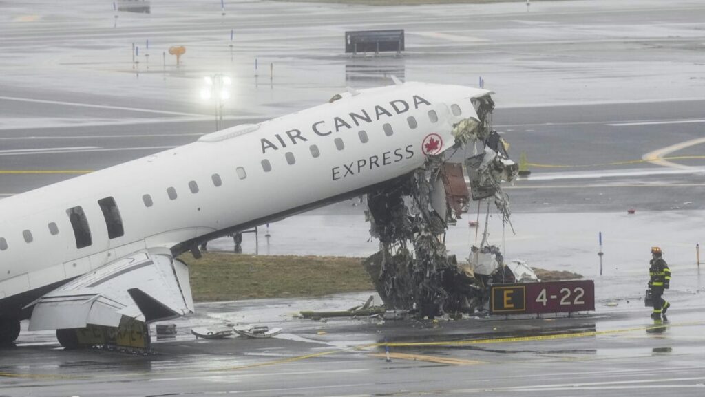 Two pilots dead after Air Canada Express jet collides with firefighting vehicle at LaGuardia