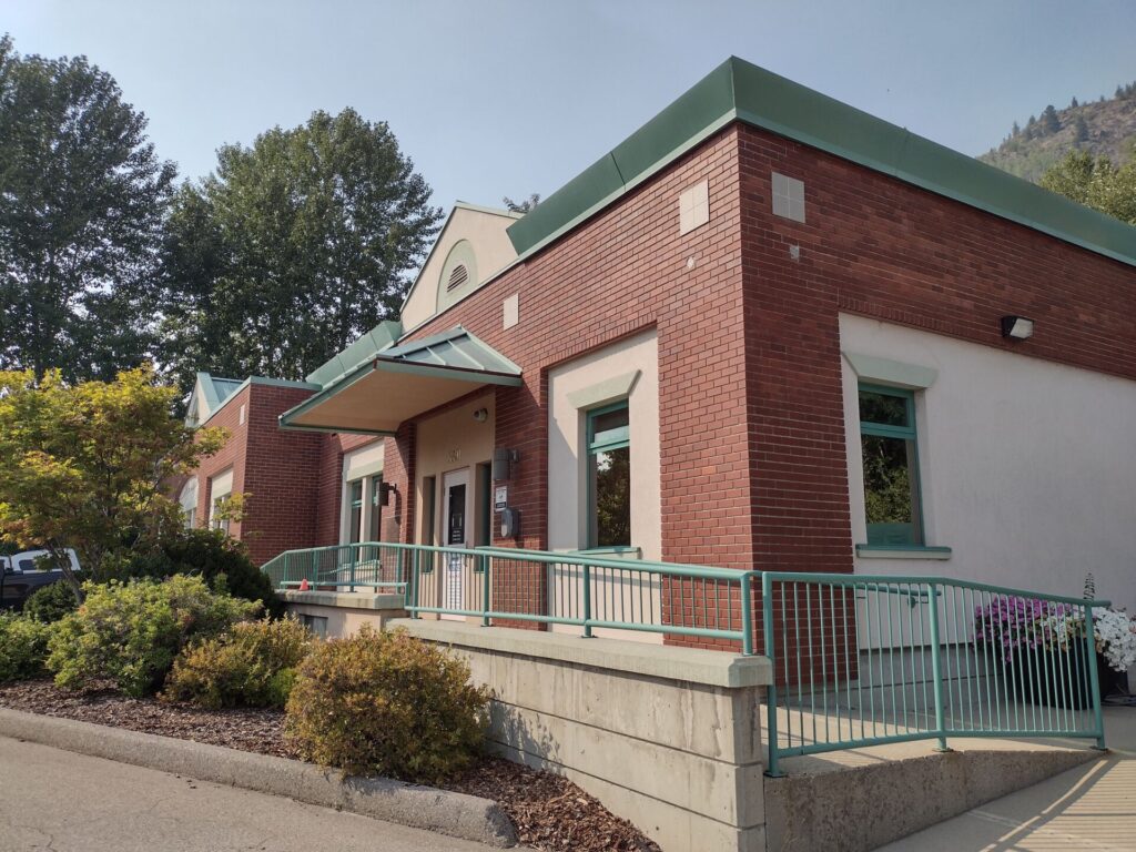 Trail man faces gun charge after home searched